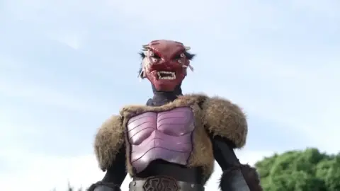 Asian Superheroines Battle Monster in Park