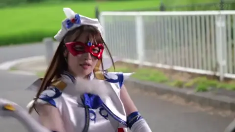 Women in Costumes and Masks