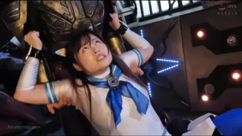 Asian Girl in Futuristic Bondage Scene