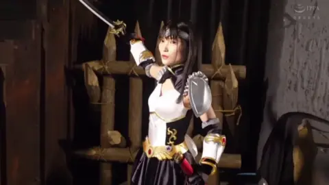 Asian Cosplayer in Fantasy Armor