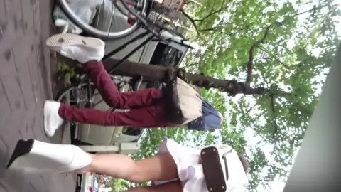 Asian Women in City Streets and Stores