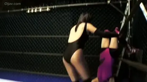 Asian Lesbians Wrestling in Cage
