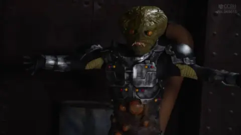 Asian Girl in Superman Costume Bondage and BDSM