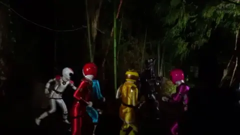 Fencing Women Engage in Intense Interaction