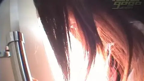 Asian Couple Intimacy in Elevator