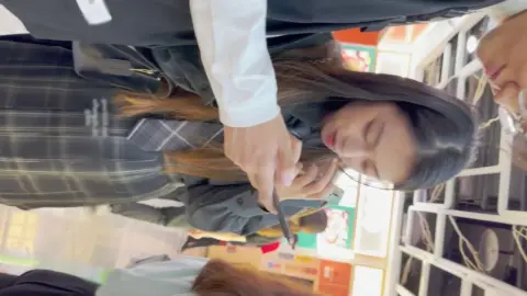 Her black stockings and short socks look unusual