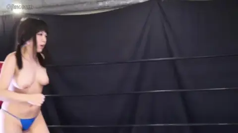 Asian Women Wrestling in Ring