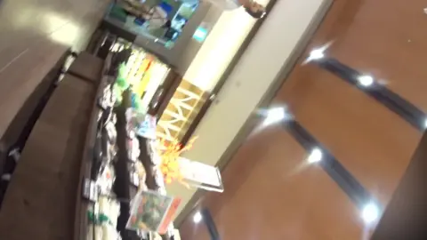 Asian Girls Shopping in Retail Store