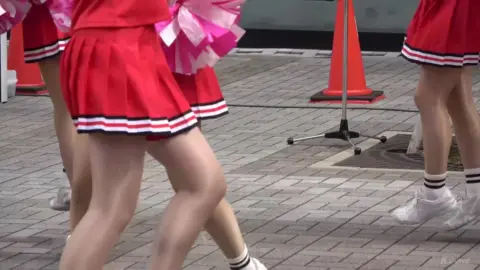 Asian Cheerleaders Dance on Street