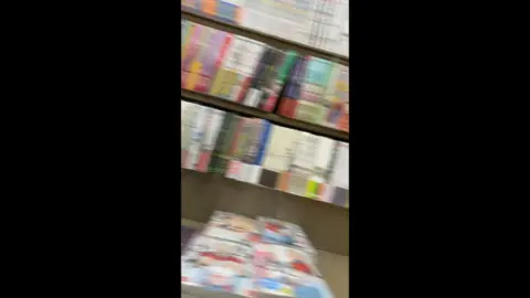 Asian girl in a bookstore
