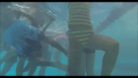 Slim Babes Swimming in Swimwear