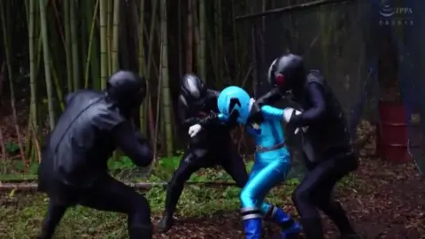 Asian Men Engage in Intense Forest Fights