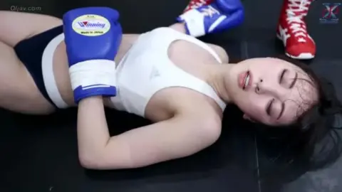 Asian Women Engage in Boxing Match