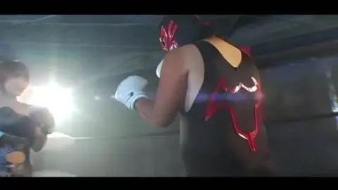 Asian Women Boxing in Ring