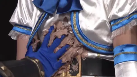 Asian Duo in Costume Roleplay Scene