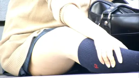 Asian Schoolgirls Exposed in Outdoor Setting