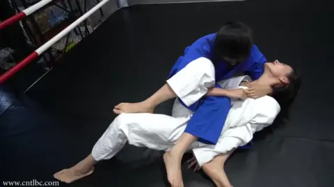 Asian Lesbians Grappling in Judogi