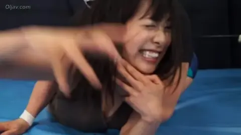 Asian Lesbians Wrestling in Ring