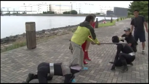 Asian Superhero Cosplay Outdoors