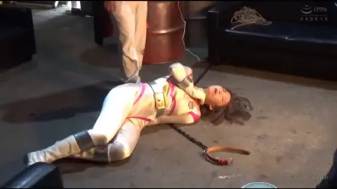 Asian Girl in Industrial Setting