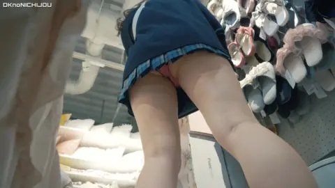 Asian Woman in Lingerie at Clothing Store