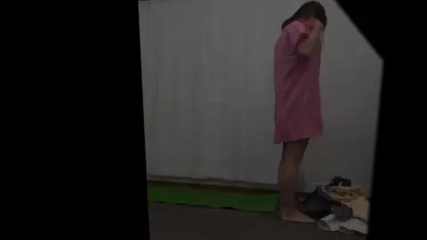 Asian Girl Changing Clothes