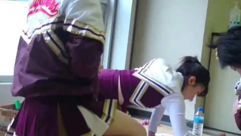 Asian Cheerleaders in Uniform