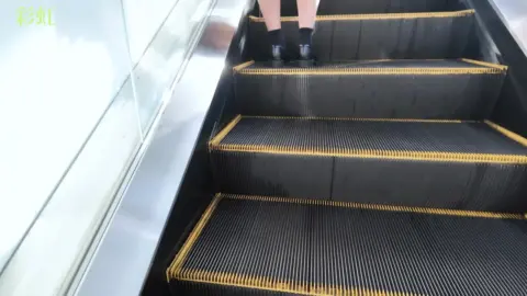 Asian Teen on Escalator and Staircase