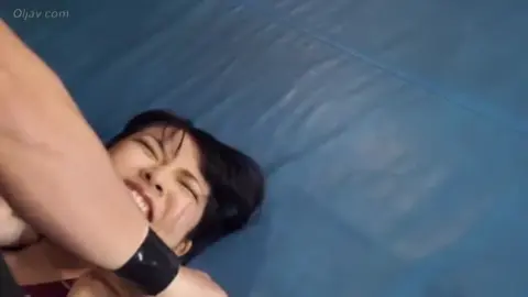 Wrestling Match with Asian Female and Caucasian Male