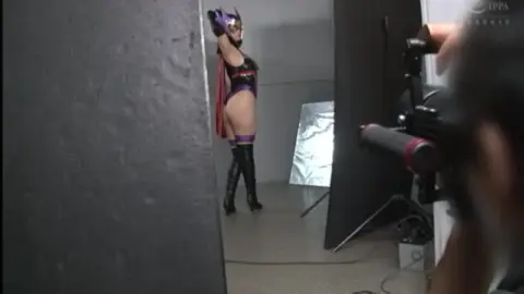 Asian Cosplay Tease in Red Shirt