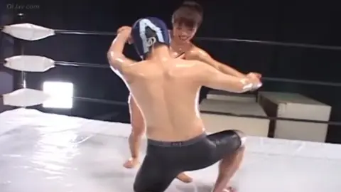 Asian Men Wrestling in Oil – Masked and Grappling