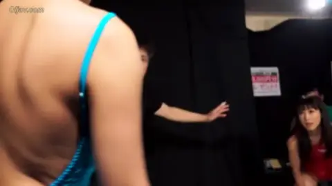 Asian Girls Wrestling in Colorful Swimsuits