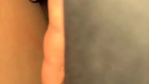 Intimate Asian Couple’s Bedroom Encounter