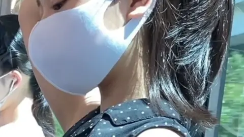 Asian Woman on Train