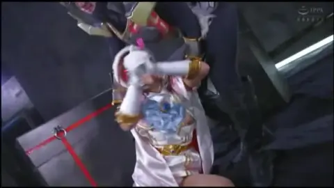 Asian Redhead in Bondage Costume