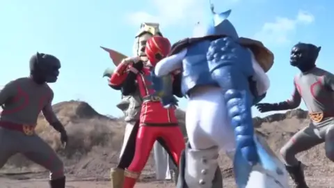 Asian Women in Colorful Costumes