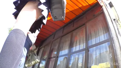 Asian Girl Lifting Skirt on Street