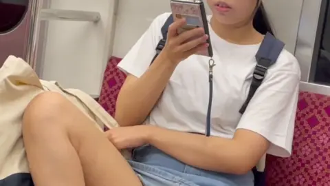 Asian Girl on Train