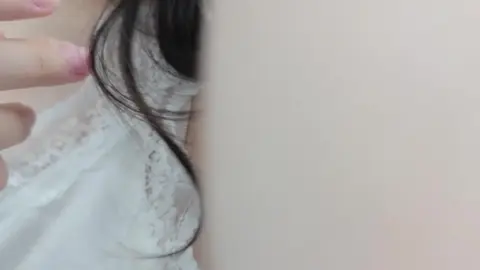 Asian Woman in White Lace Top Shows Armpit Hair