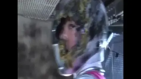 Asian Performer in Futuristic Costumes