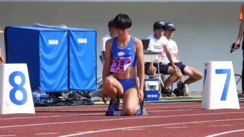 Asian Teen Girls at Track and Field Stadium