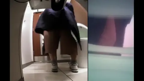 Asian Girl Urinating in Bathroom