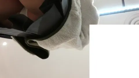 Dark-Haired Beauty in Black Socks and Boots