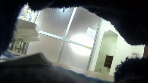 Asian Girl in Bathroom with Dog