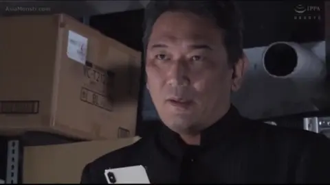 Asian Lingerie Scene with Tattooed Performer