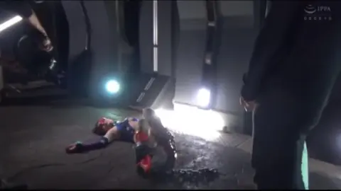 Asian Performers in Costume Attire and Bondage