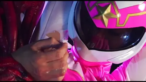 Men in Costumes and Helmets Intimate Encounter