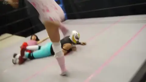 Asian Wrestlers in Pink and White Outfits