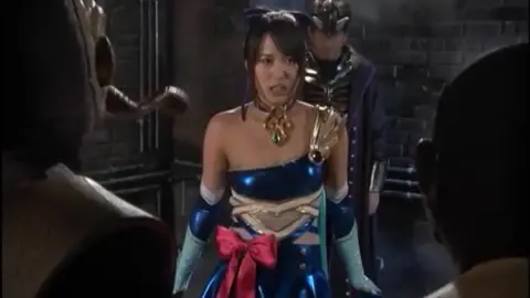 Asian Girls in Costumes Engage in Erotic Play