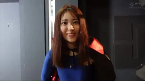 Asian Cosplay Nun and Superheroine Scene